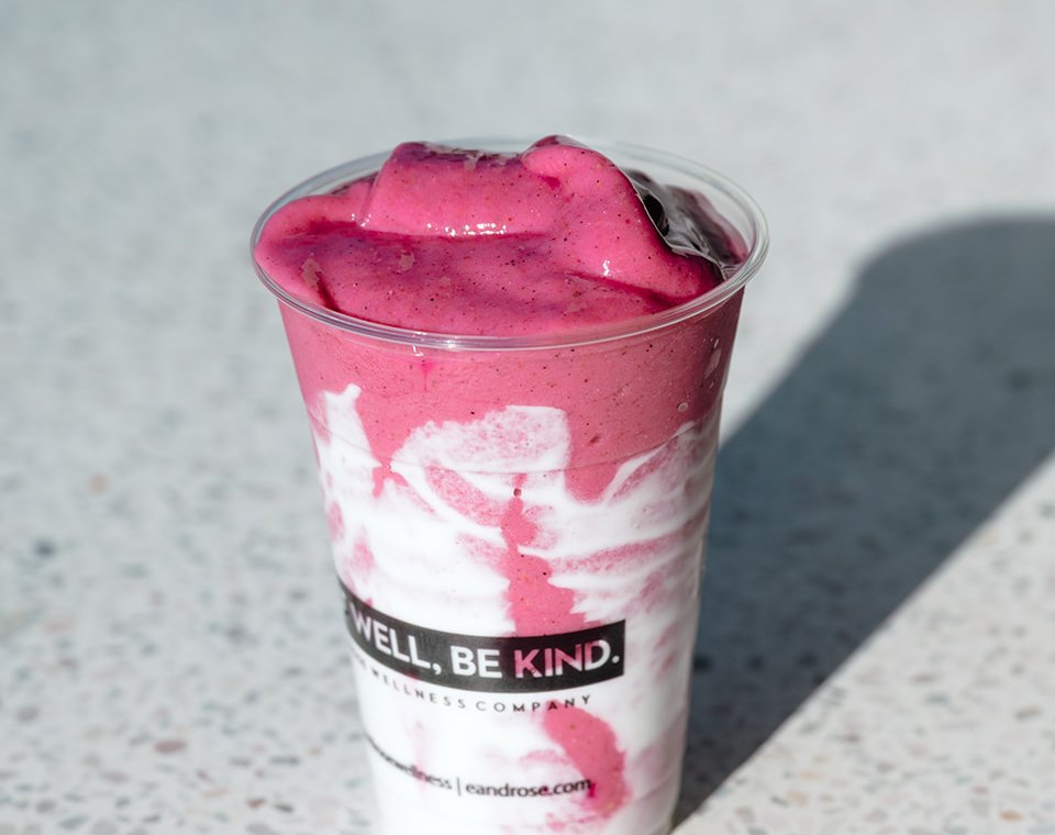 E+ROSE Best in Glow smoothie in a branded cup